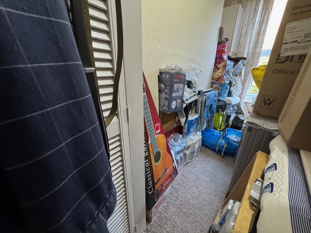Lot: 135 - FREEHOLD INVESTMENT OF THREE FLATS - Top Maisonette store room